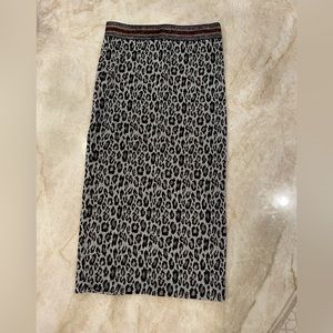 Long, tight cheetah print skirt